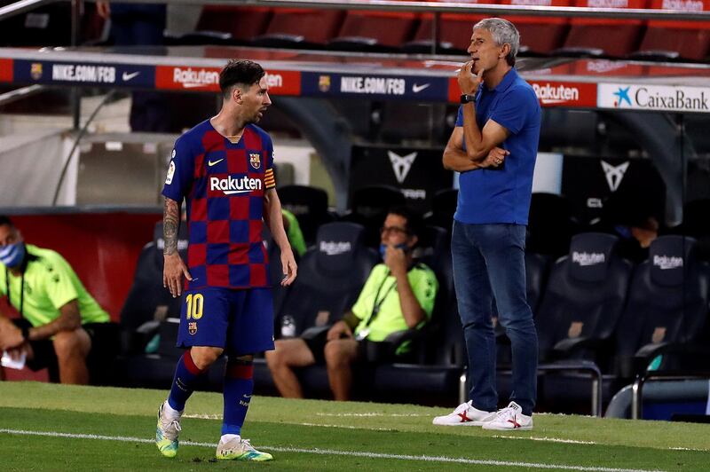 Barcelona manager Quique Setien and forward Lionel Messi. EPA