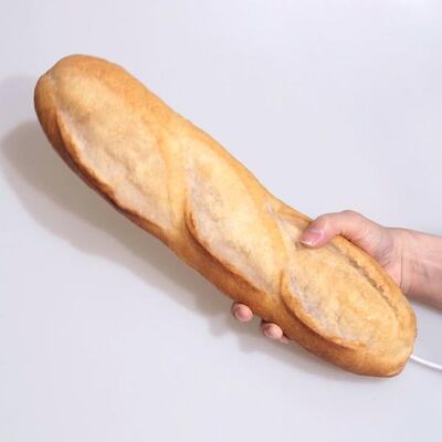 The bread lamp is an actual baguette covered in resin. Courtesy goop.com