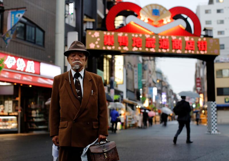 Shinichiro Sekozawa, 89, a former ship's captain, poses for a portrait as he visits the Sugamo district, an area popular with the Japanese elderly, in Tokyo, Japan, Japan. Reuters