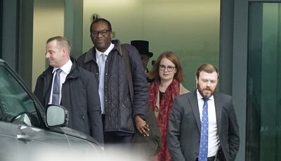 Kwasi Kwarteng arrived at Heathrow Airport on Friday after breaking off a US trip. PA 