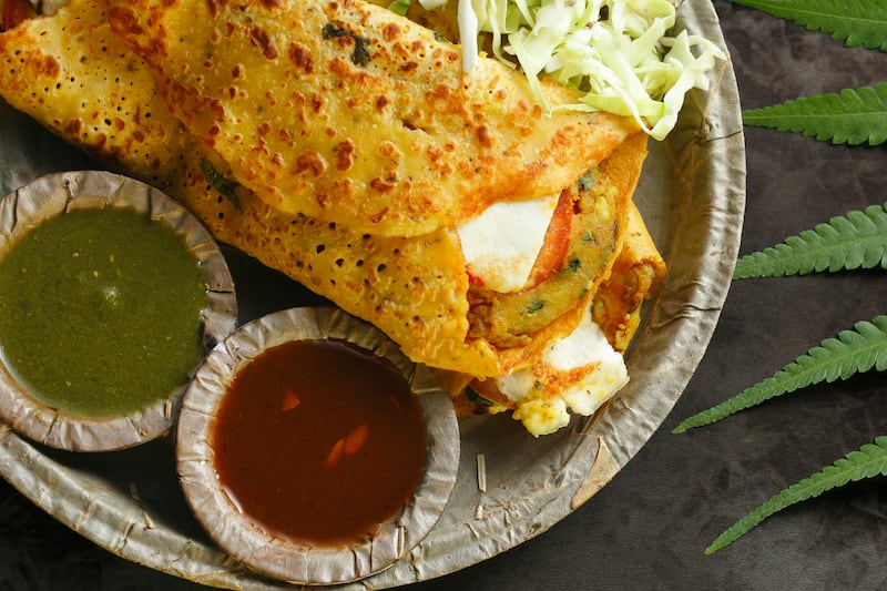 Moong dal chilla is a filling yet fibre-rich breakfast option. Getty Images