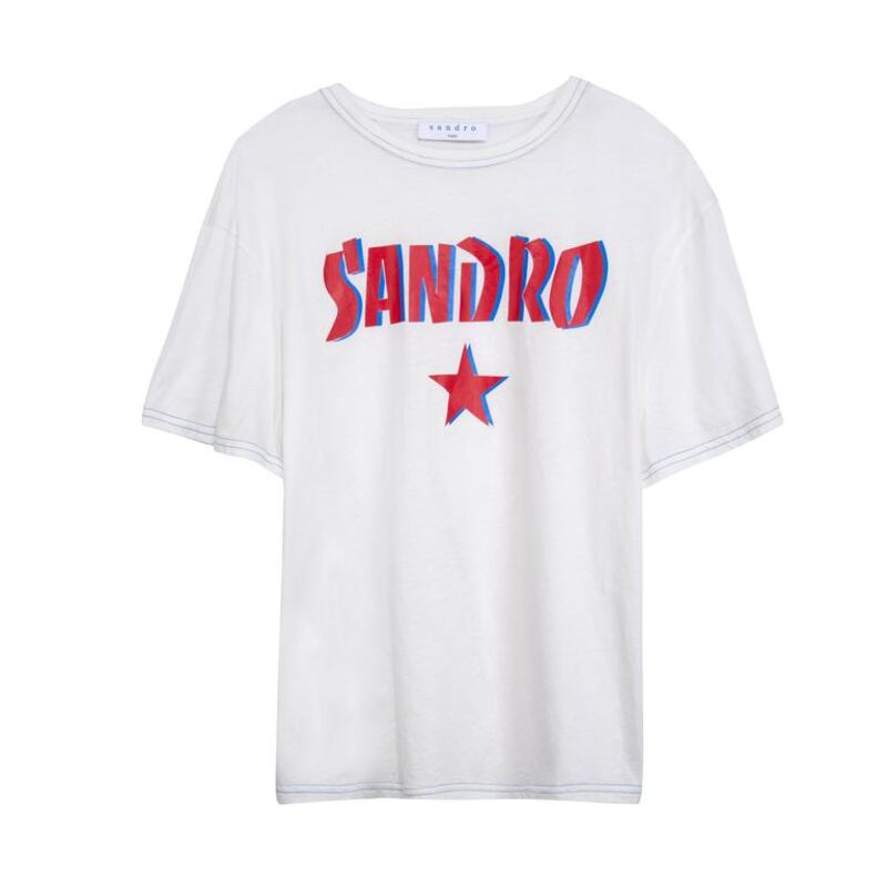 A white T-shirt with a bold, colourful logo, such as this Sandro piece, is a must-have wardrobe item for the summer season. Courtesy of Sandro