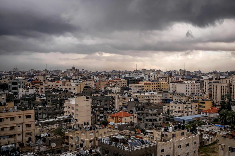 A Picture shows dark clouds over of gaza city during heavy rain.  AFP
