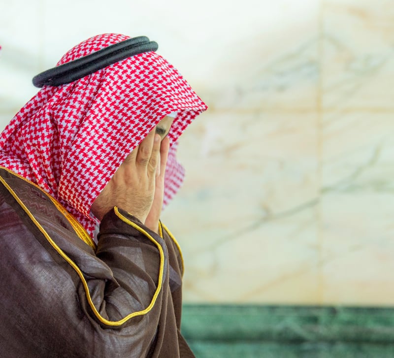 The Crown Prince at prayer during the visit.
