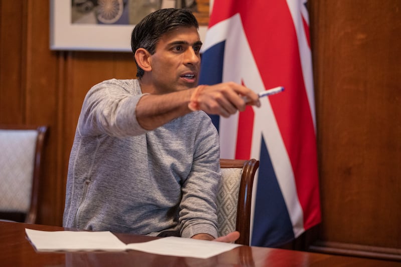 The Treasury released pictures of Rishi Sunak making final preparations for his speech in a Downing Street study.