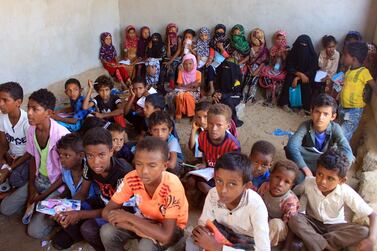 Displaced Yemeni children attend a class in a house turned into a school in the northern province. AFP