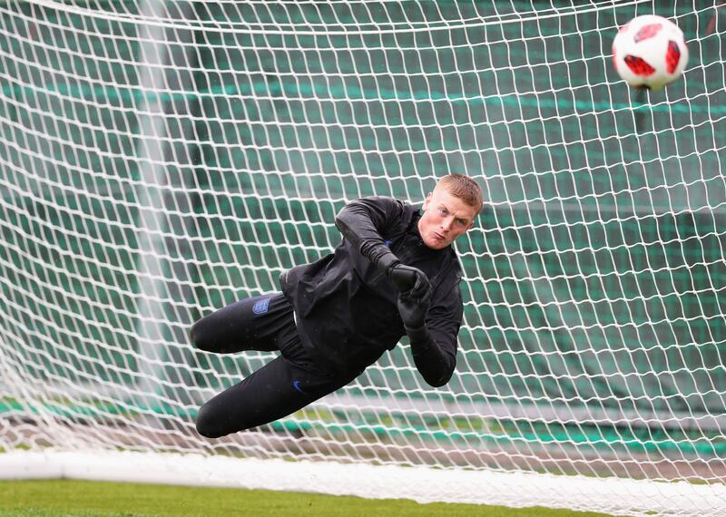 Jordan Pickford dives to make a save. Getty Images