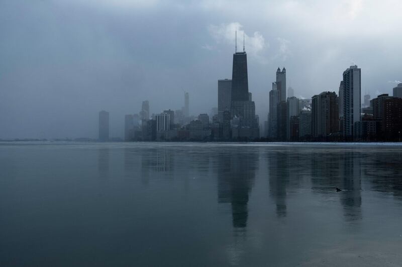 The fog begins to cover the city skyline in Chicago. Reuters