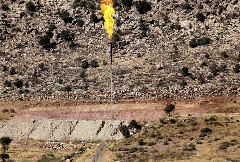 Gas is flared off at an oil field in Sheikhan, near Mosul. Islamic State crude reserves and resultant revenues are declining. Ahmad Al-Rubaye / AFP