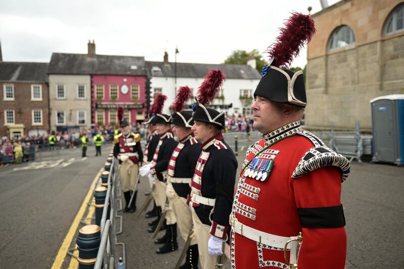 Members of the military await the arrival of King Charles at Hillsborough Castle. Getty Images