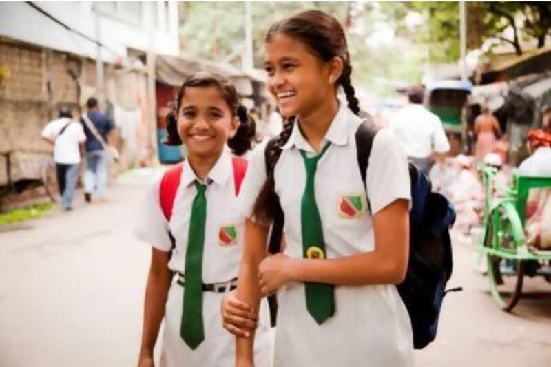 Girls walk to school in India. Courtesy 10x10act.org