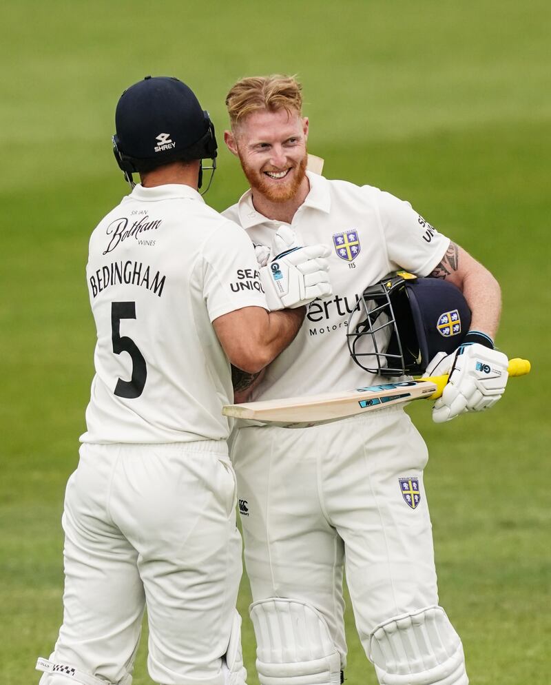 Ben Stokes celebrates with David Bedingham after reaching his hundred. PA