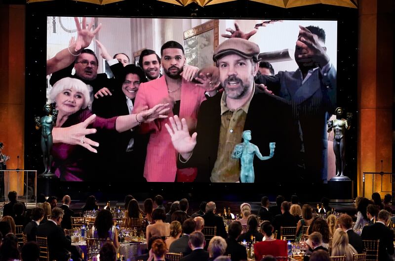 Jason Sudeikis appears on screen to accept the award for Outstanding Performance by a Male Actor in a Comedy Series for 'Ted Lasso'. AP