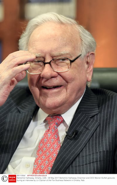 Mandatory Credit: Photo by AP/REX/Shutterstock (8811199af)
Berkshire Hathaway Chairman and CEO Warren Buffett gestures during an interview by Liz Claman of the Fox Business Network in Omaha, Neb
Berkshire Hathaway, Omaha, USA - 08 May 2017