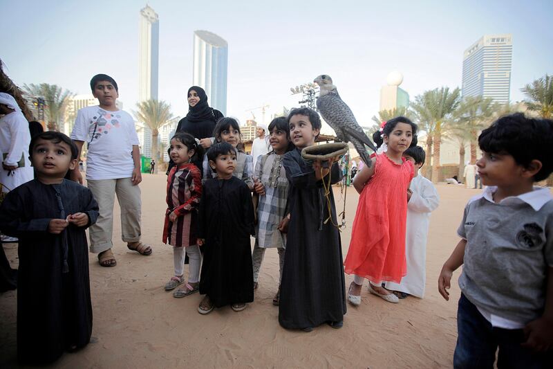 March 4, 2013 (Abu Dhabi)Abdullah Mian Sodagar shows off one of his falcons at the Qasr Al Hosn Festival in Abu Dhabi March 4, 2013. (Sammy Dallal / The National)