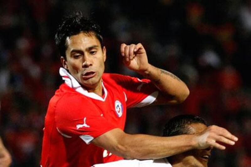 Luis Jimenez, in red playing for Chile, agreed a four-year deal to join Al Ahli in June.