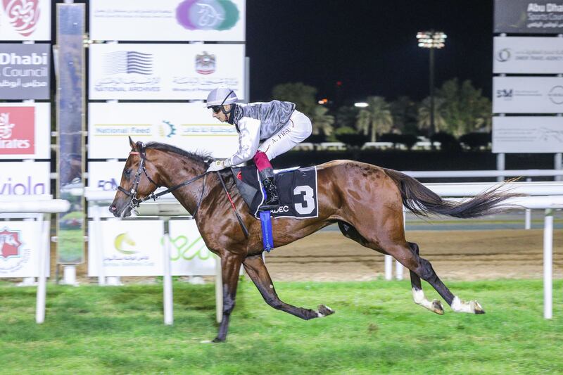 Bahar Muscat, ridden by Antonio Fresu, wins the Listed race at Abu Dhabi Equestrian Club. Shutterstock