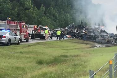 The aftermath of the multi-vehicle accident on a rain-drenched highway in Alabama, US, in which nine children and one adult were killed. Reuters 