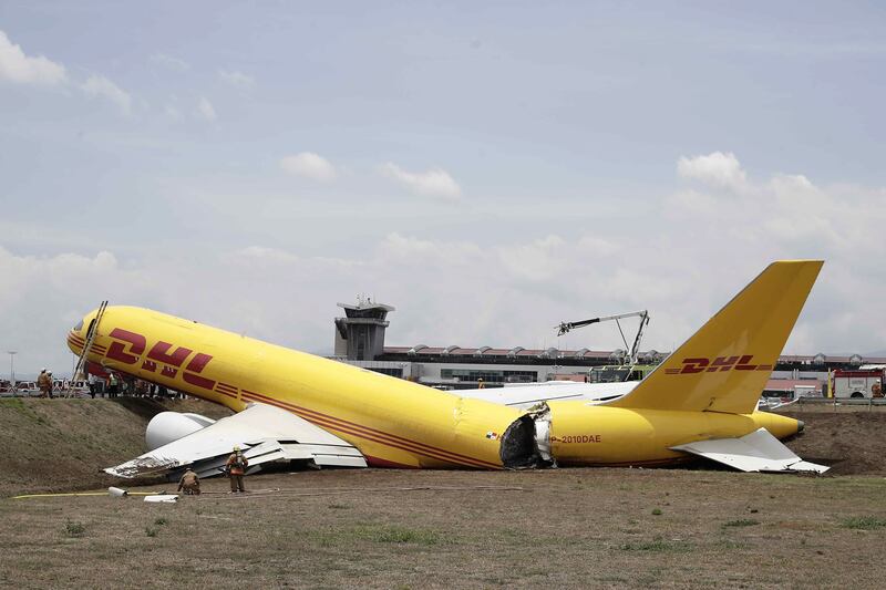 A DHL cargo plane that broke in two after it skidded off the runway at  Juan Santamaria airport, Costa Rica. The Boeing 757 returned to the airport after experiencing problems after take-off. EPA