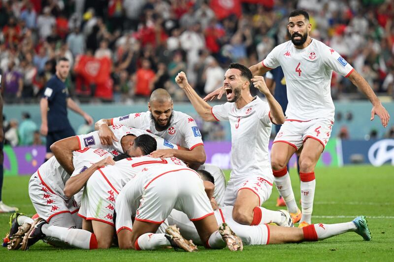 Wahbi Khazri of Tunisia celebrates with teammates after scoring their winner against France in the World Cup Group D match at Education City Stadium on November 30, 2022, in Al Rayyan, Qatar. Getty 