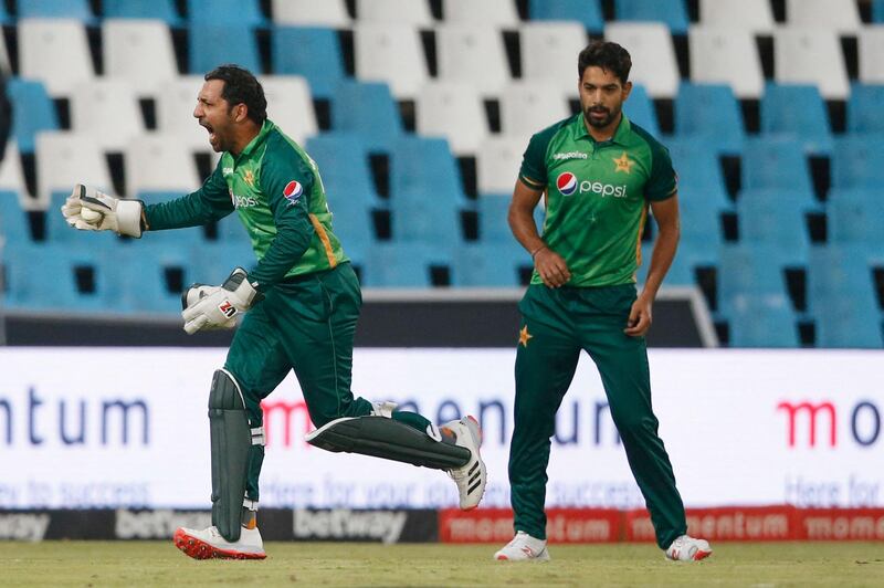 Pakistan's Sarfaraz Ahmed, left, celebrates the dismissal of South Africa's Andile Phehlukwayo. AFP