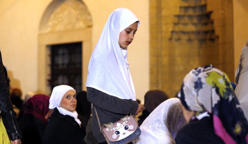 Bosnian Muslim women pray at the Gazi Husrev Bay's Mosque in Sarajevo, Bosnia and Herzegovina.  EPA