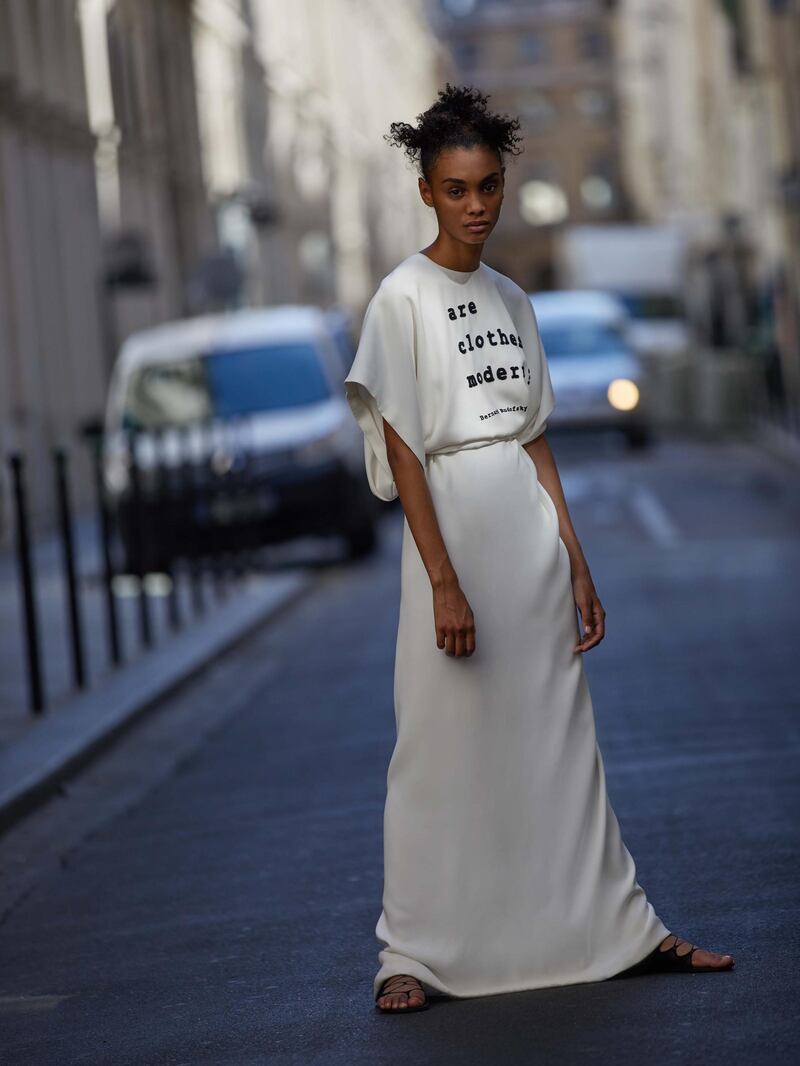 through the lens: Photography | Chantelle Dosser fashion director | Sarah MaiseyPeplos dress in white silk cady, with quote by Bernard Rudofsky, Dior Haute CoutureAll prices on request 