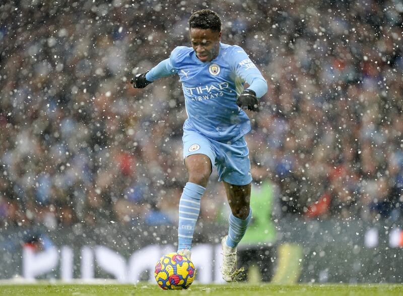 Manchester City forward Rahee, Sterling runs with the ball. EPA