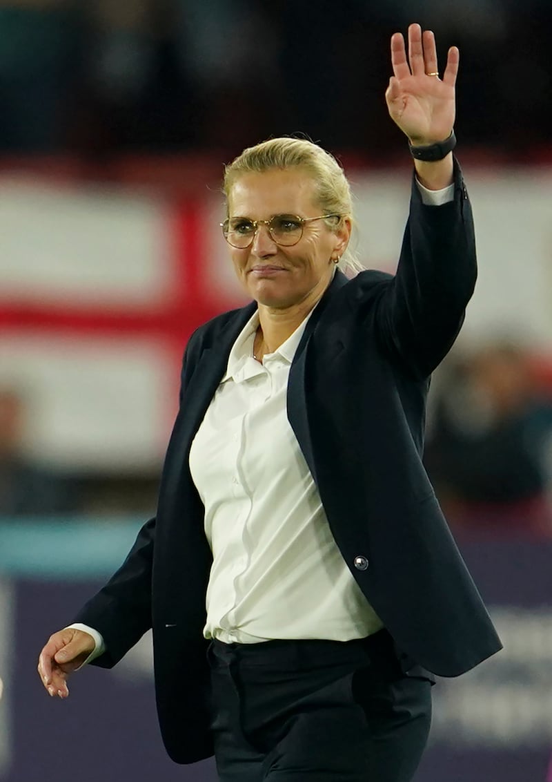 England's manager Sarina Wiegman waves at the end of the game. AP