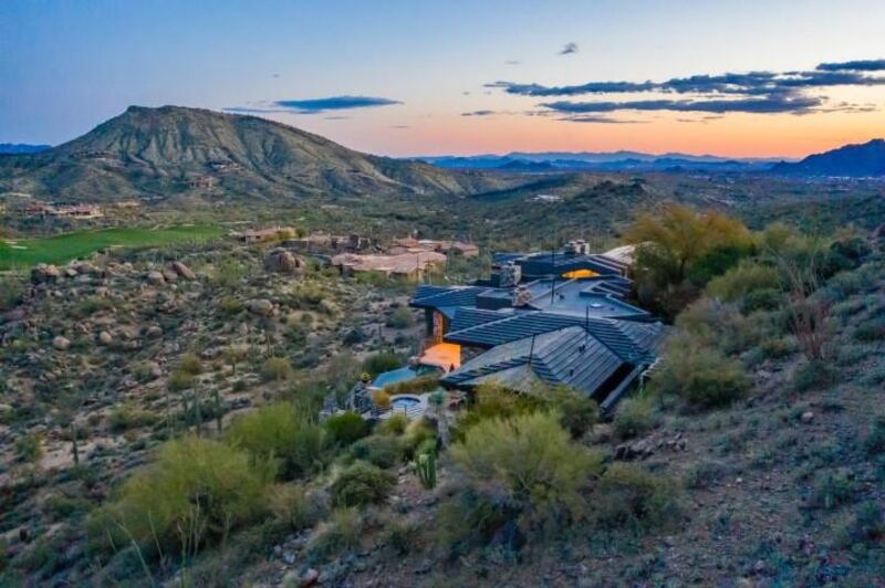 The four-bedroom home is embedded into a hillside. Courtesy Engel & Volkers