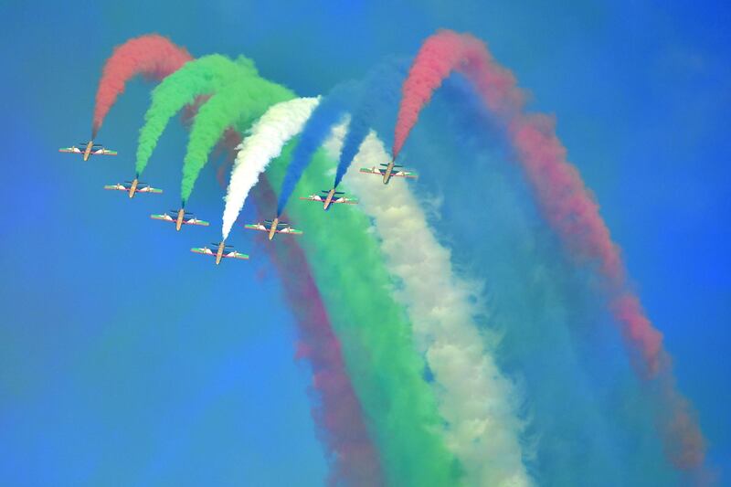 The Al Fursan flying team flies over the Yas Marina circuit. AFP