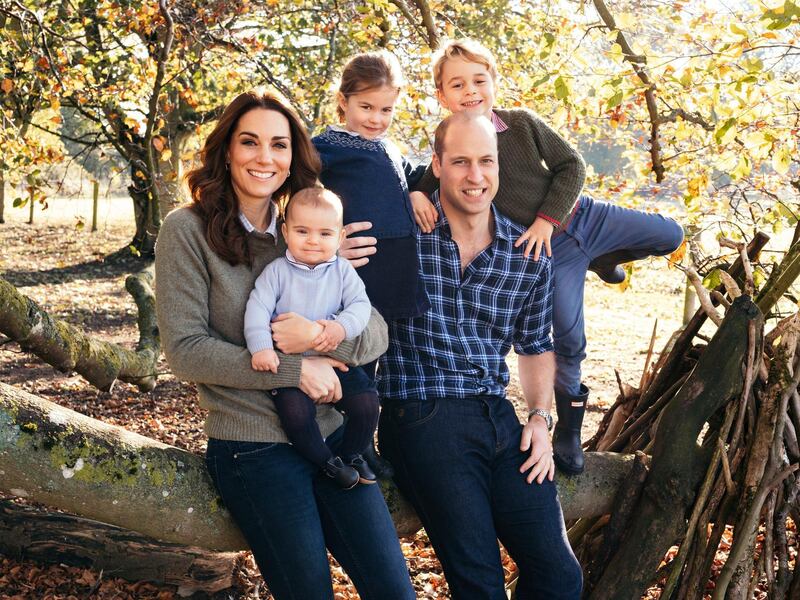 This photo released by Kensington Palace, shows the photo taken by Matt Porteous of Britain's Prince William and Kate, Duchess of Cambridge with their children Prince George, right, Princess Charlotte, center, and Prince Louis at Anmer Hall in Norfolk, east England, which is to be used as their 2018 Christmas card.  AP