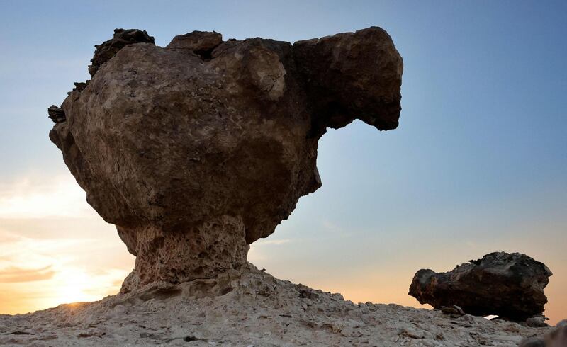 This picture taken on April 27, 2021 shows a partial view of the Rock Garden, also known as Duqm Stone Park, in the port town of Duqm in al-Wusta province in central-eastern Oman, about 540 kilometres south of the Gulf sultanate's capital Muscat. The Rock Garden is one of Oman's major geological sites, featuring unusual rock formations. / AFP / Karim SAHIB
