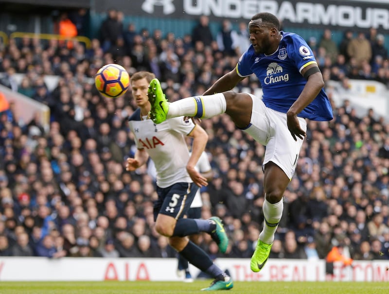 Everton's Romelu Lukaku attempts to connect with a cross as Tottenham Hotspur's Jan Vertonghen looks on during the English Premier League match between Tottenham Hotspur and Everton at White Hart Lane in London.