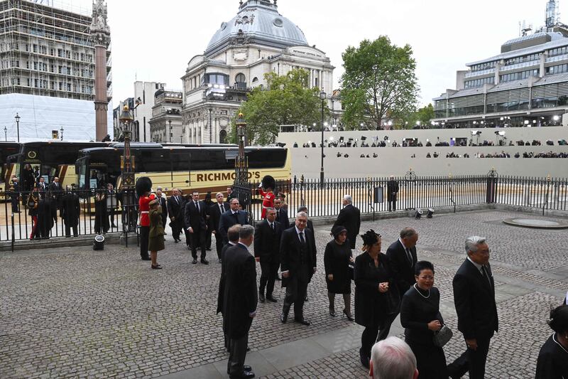 Guests arrive at Westminster Abbey for the funeral of Queen Elizabeth II in London. AFP
