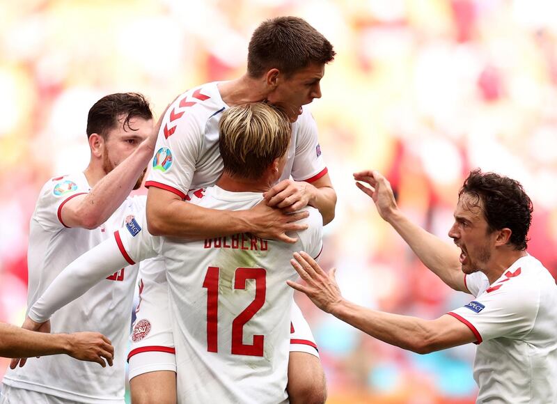 Kasper Dolberg of Denmark celebrates scoring the opening goal against Wales. EPA