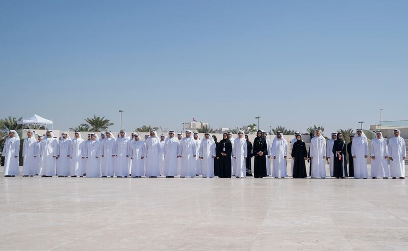 ABU DHABI, UNITED ARAB EMIRATES - November 30, 2017: UAE citizens observe a moment of silence during a Commemoration Day flag raising ceremony at Wahat Al Karama, a memorial dedicated to the memory of UAE’s National Heroes in honour of their sacrifice and in recognition of their heroism.

( Mohamed Al Hammadi / Crown Prince Court - Abu Dhabi )
---