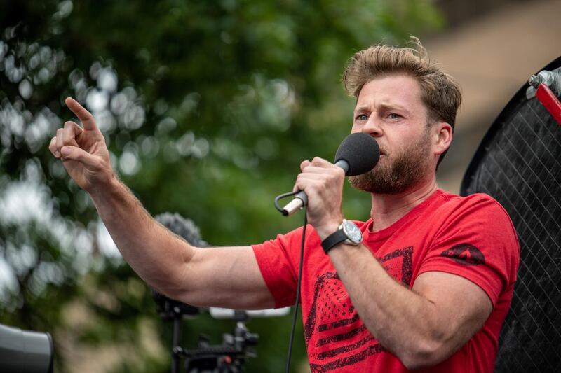 Infowars host Owen Shroyer arrives at a protest against mandates to wear masks in Austin. Reuters