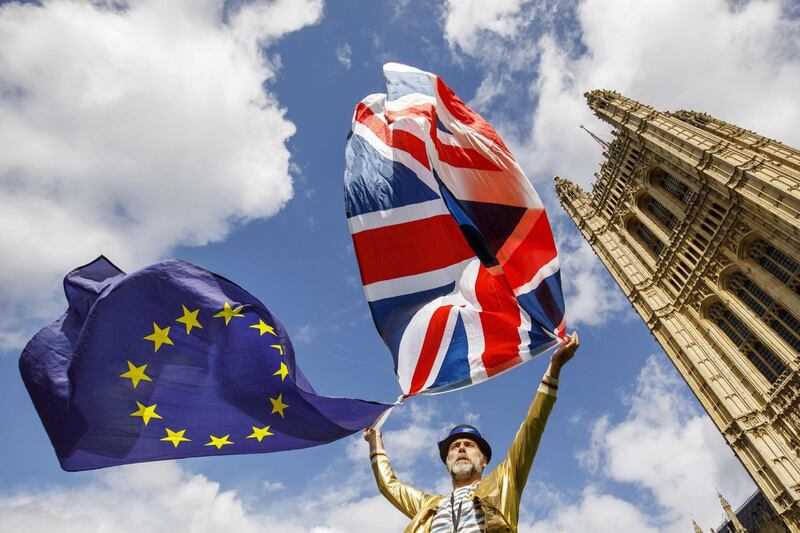 Pro-European Union demonstrators protest outside the Houses of Parliament in central London against the first vote today on a bill to end Britain's membership of the EU on September 11, 2017. 
MPs hold their first vote today on a bill to end Britain's membership of the EU, which ministers say will avoid a "chaotic" Brexit but has been condemned as an unprecedented power grab. / AFP PHOTO / Tolga Akmen