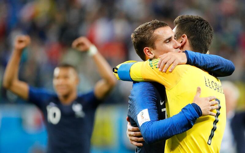France's Antoine Griezmann and Hugo Lloris celebrate after winning the game 1-0. EPA
