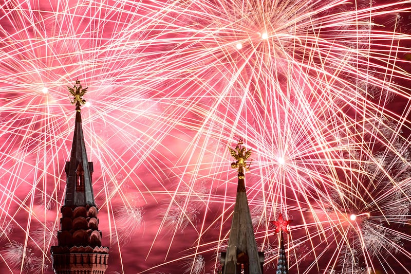 Fireworks go off at the Spasskaya Tower during an international military music festival in the Red Square in Moscow. AFP