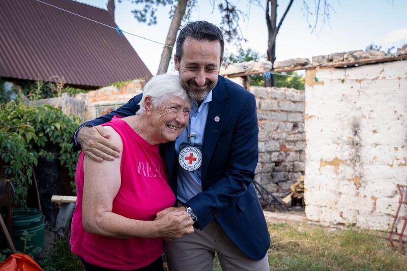 Meeting a beneficiary of an ICRC cash assistance programme in Nova Buda village, Ukraine, in August 2022