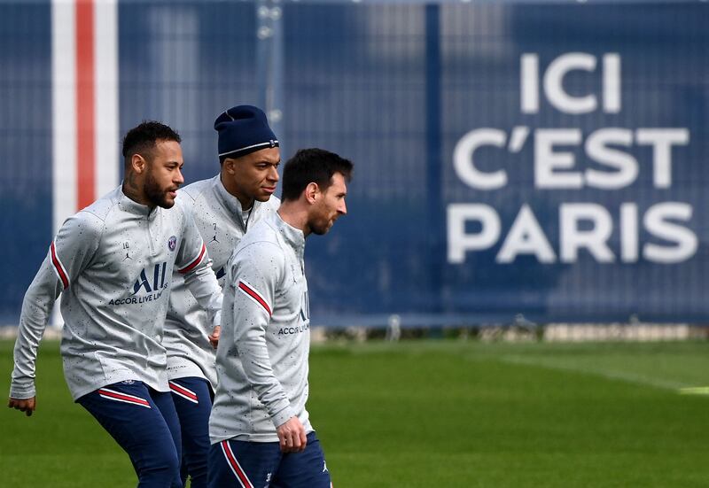 Neymar, Kylian Mbappe and and Lionel Messi during training. AFP