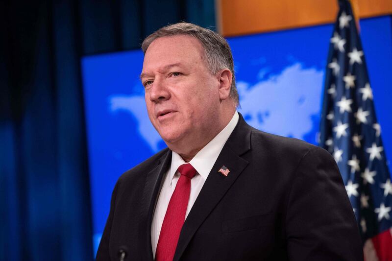 (FILES) In this file photo taken on March 11, 2020 US Secretary of State Mike Pompeo delivers remarks on the 2019 Country Reports on Human Rights Practices at the State Department in Washington, DC. Secretary of State Mike Pompeo warned Iraq on March 16, 2020 the US would retaliate "as necessary" against any new assaults on Americans after a slew of rocket attacks.The United States last week launched airstrikes against an Iranian-allied paramilitary group following a deadly attack on an Iraqi base housing US troops -- but rocket fire has continued unabated.
 / AFP / NICHOLAS KAMM
