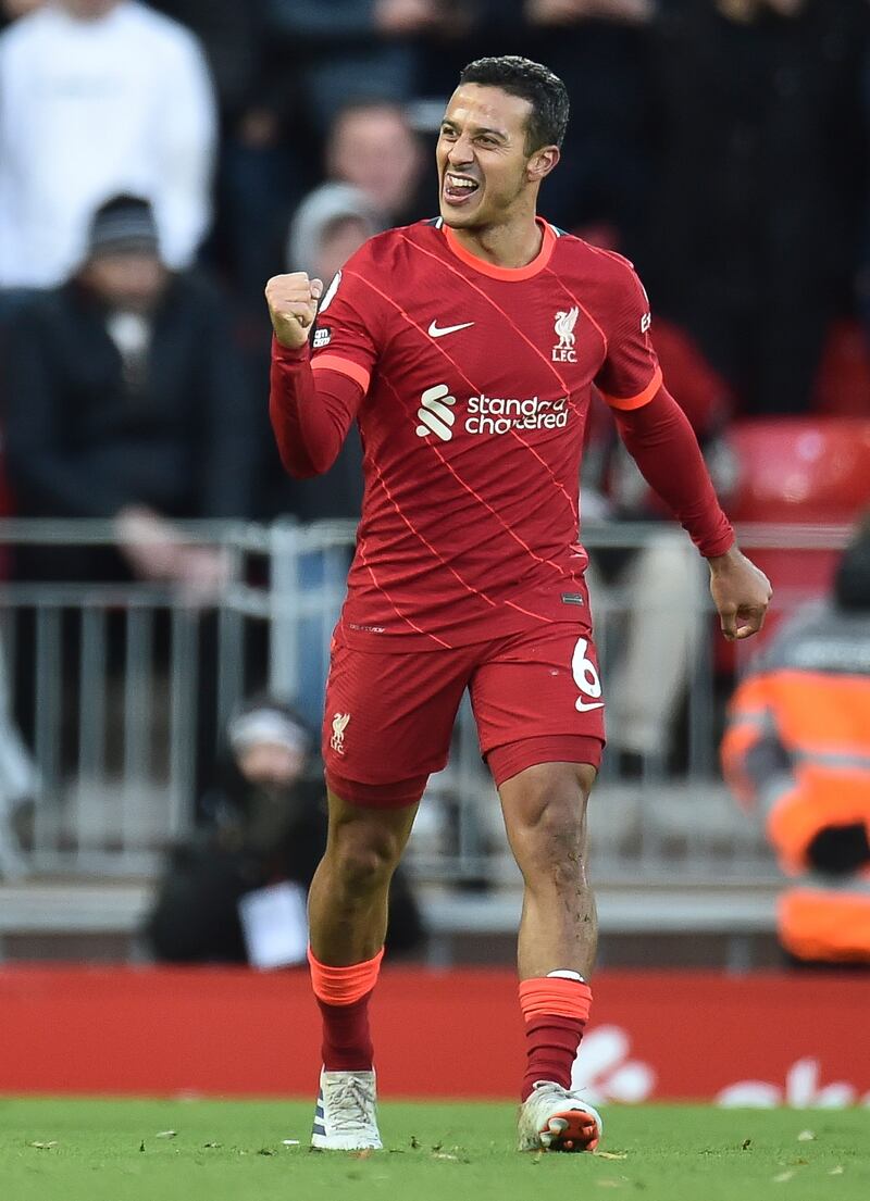 Liverpool's Thiago Alcantara celebrates after making it 3-0. EPA