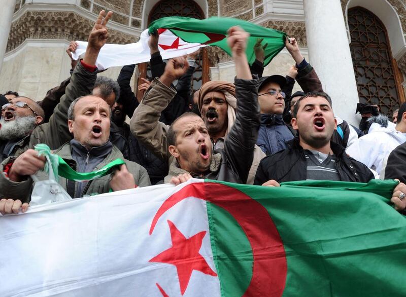Family members of victims who disappeared during the war in Algeria in the 1990's wave their national flag and shout slogans as they take part in a demonstration on March 15 calling for justice and against ailing president Abdelaziz Bouteflika's decision to seek a fourth term in the next month's election. There is growing anger and derision in Algeria over Mr Bouteflika's intention to run due to his fragile health, with protests multiplying and many critics arguing that he is in no fit state to run the country. Farouk Batiche/AFP Photo 

