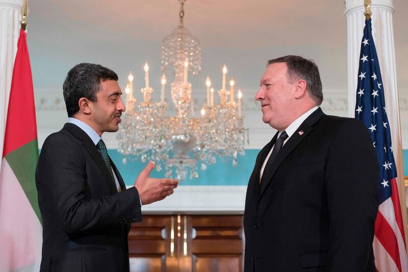 US Secretary of State Mike Pompeo speaks with UAE Foreign Minister Sheikh Abdullah bin Zayed al-Nahyan at the Department of State in Washington, DC, on May 14, 2018. / AFP / JIM WATSON
