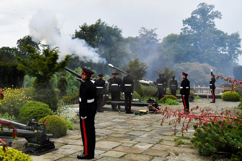 The 206 Battery of the Royal Artillery, the Ulster Gunners, fire a midday commemorative gun salute in honour of the beginning of the queen's platinum jubilee celebrations, at Hillsborough Castle, Northern Ireland. Reuters