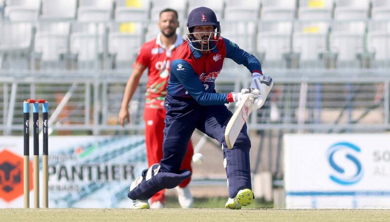 Dipendra Singh Airee of Nepal bats during the ICC World T20 Global Qualifier match against Oman in Muscat on February 18, 2022. Nepal won the match by 39 runs. All photos Subas Humagain for The National