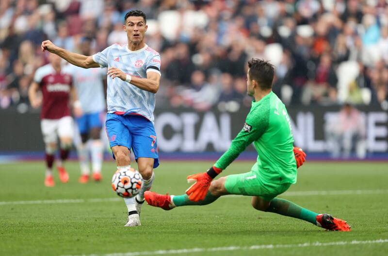Cristiano Ronaldo has a shot saved by West ham goalkeeper Lukasz Fabianski. Getty Images